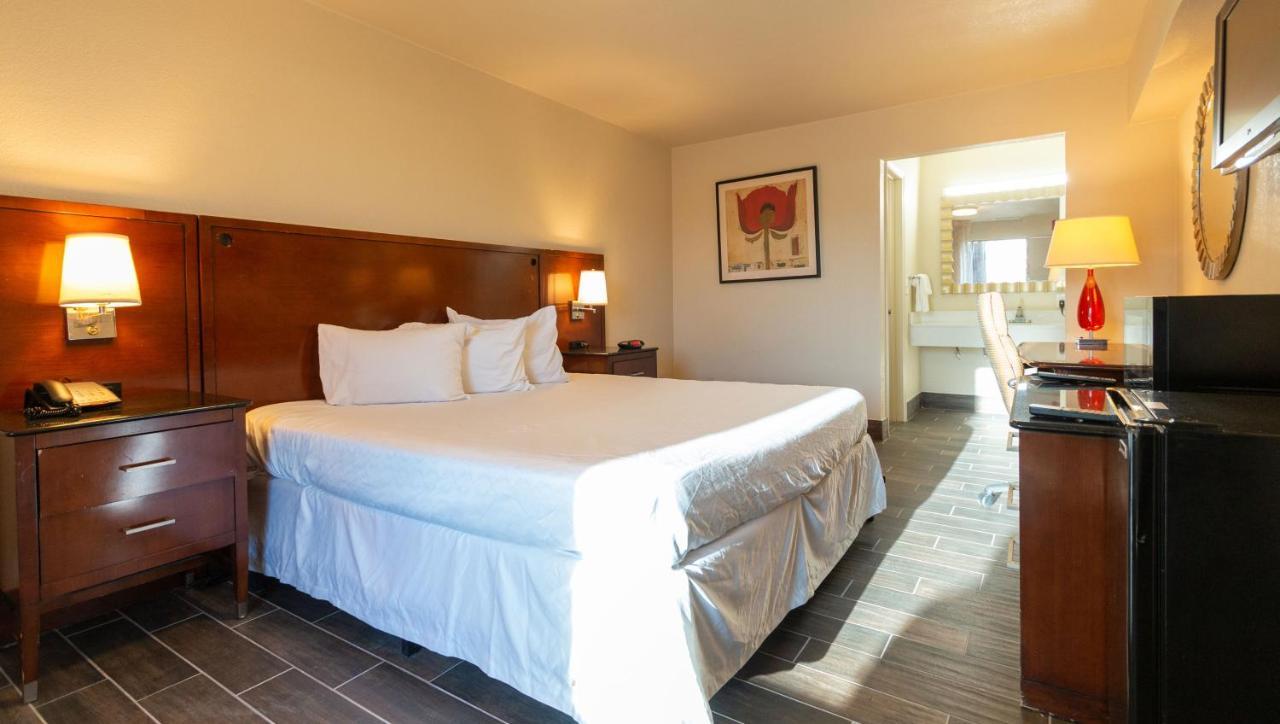 Magnuson Extended Stay And Suites Airport Hotel Ирвинг Экстерьер фото