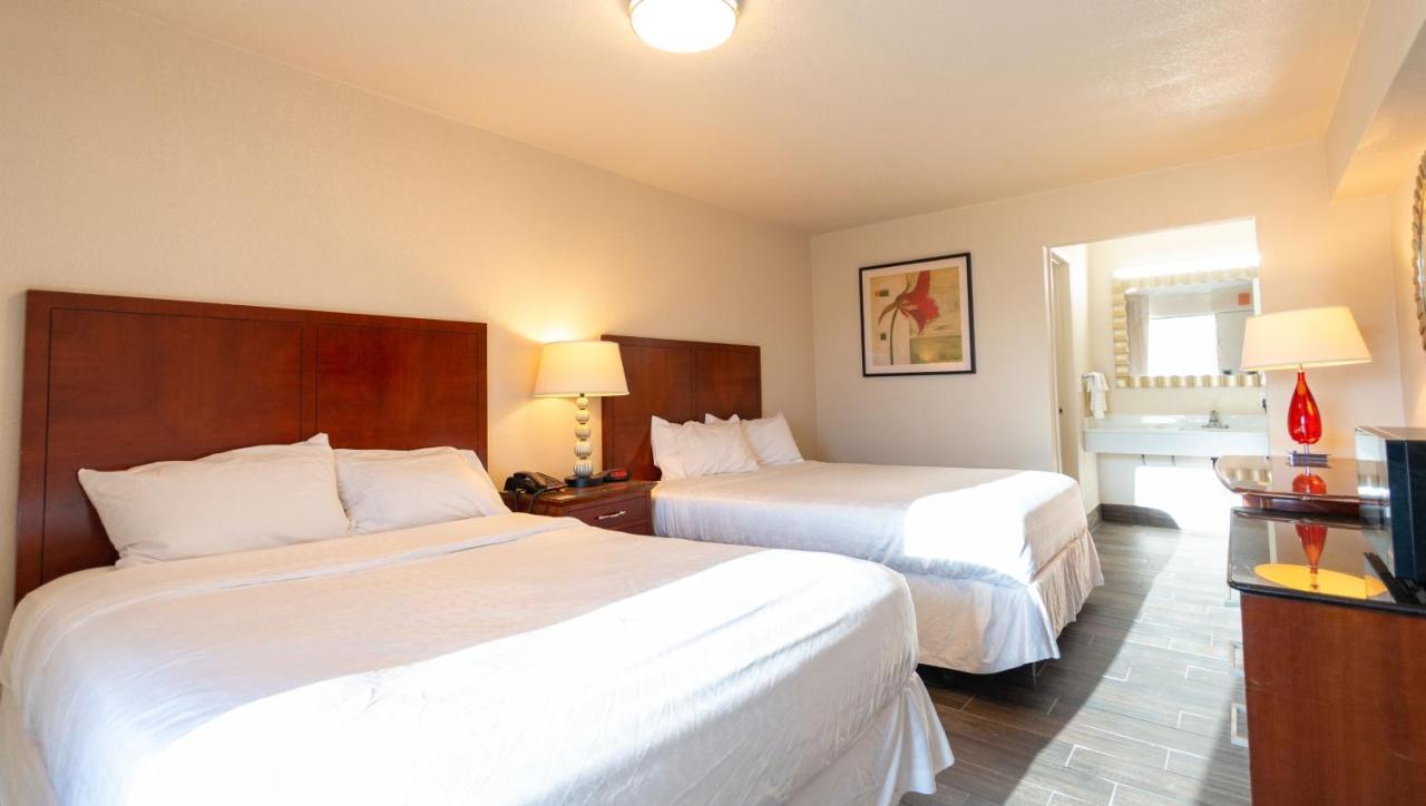 Magnuson Extended Stay And Suites Airport Hotel Ирвинг Экстерьер фото