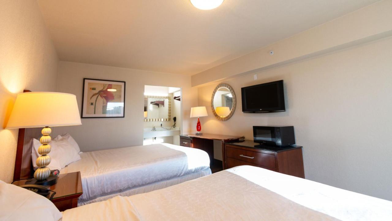 Magnuson Extended Stay And Suites Airport Hotel Ирвинг Экстерьер фото